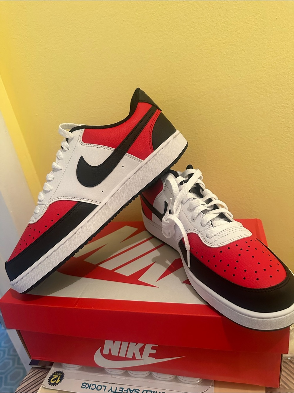 Nike Low-Top Sneakers in Red, White, and Black